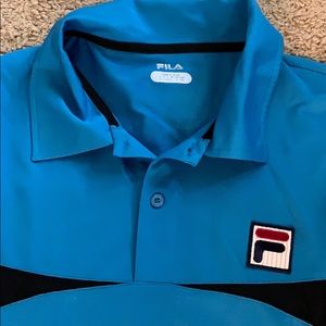 Blue Fila Tennis polo shirt.